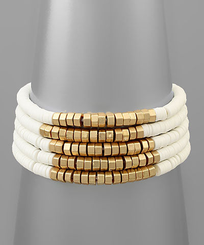 Set of White and Gold Bracelets